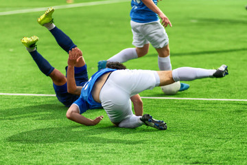 Soccer players play bad football. They fail during the World Cup. A footballer is injured during a violation of the rules of the game. Team leaves the competition.