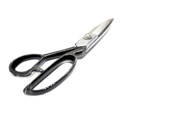 Scissors on a white background, scissors with a black handle for fabrics and leather