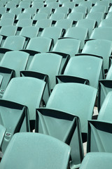 Obraz premium Close up of back of a green arena seats