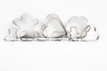 Different metal cutters for cookies, baking concept with copy space