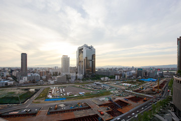 Osaka, Japan - June 22, 2018: View from roof of Osaka Station over construction site