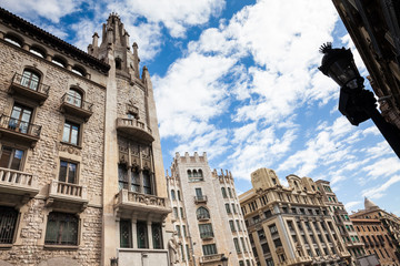 Fototapeta na wymiar Buildings facades at the Gothic Square in Barcelona, Spain