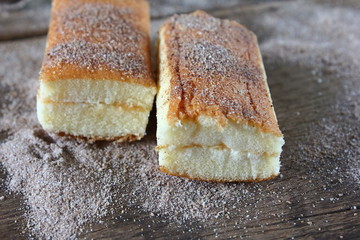 fresh sweet homemade delicious cake on wooden background