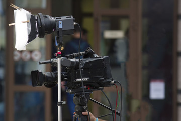 Professional camcorder shooting a video on the street