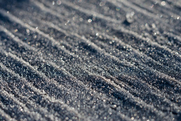 Morning frost on textured surface
