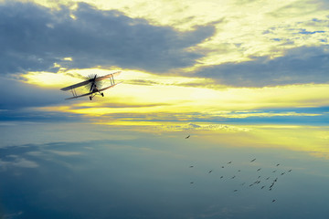 Fototapeta na wymiar Old airplane on the blue sky 