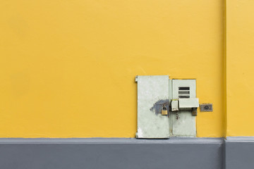 Set of lines on the wall with padlocked door