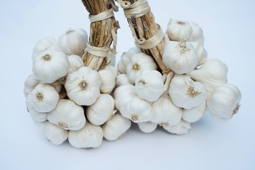 Fresh raw garlic bundle, copy space, kitchen raw ingredient concept