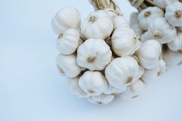 Fresh raw garlic bundle, copy space, kitchen raw ingredient concept