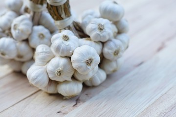 Fresh raw garlic bundle, copy space, kitchen raw ingredient concept