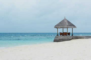 Tranquil beach scene. Exotic tropical beach landscape for background or wallpaper. Design of summer vacation holiday concept.