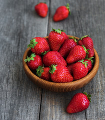 Bowl with fresh strawberries