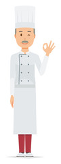 An elderly male chef wearing a cook coat is playing an okay sign