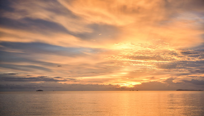 golden sunset with sea and cloud