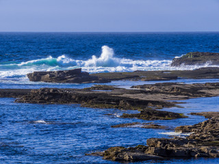Wild Atlantic ocean water at a rocky coast