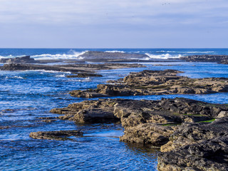 Wild Atlantic ocean water at a rocky coast