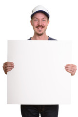 Portrait Of Man Isolated Against White Background