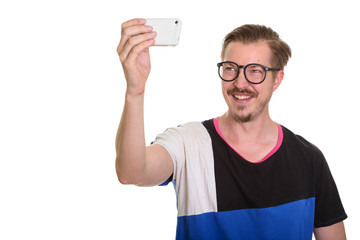 Portrait Of Man Isolated Against White Background