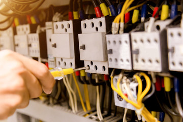 Electrician measurements with multimeter tester System ready.