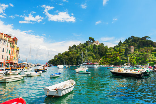 Sea shore with boats in Portofino, Italy.