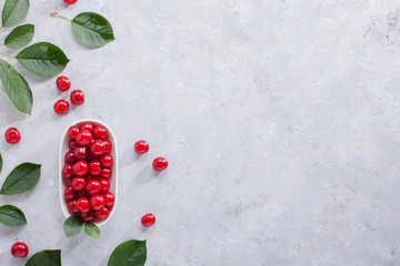 Berry Red on the Table. Ripe Fruit. Background Cherry Berries on the Surface with Leaves