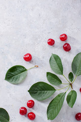 Berry Red on the Table. Ripe Fruit. Background Cherry Berries on the Surface with Leaves