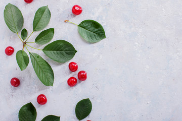 Berry Red on the Table. Ripe Fruit. Background Cherry Berries on the Surface with Leaves