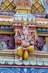 Hindu God Ganesha statue in temple, island Mauritius, close up