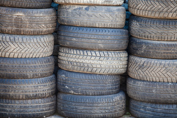 Used wheel tires stacked in stacks