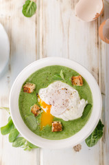 Spinach soup with poached egg