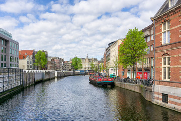 Colorful traditional old buildings in sunshine day at Amsterdam, Netherlands