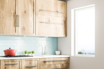 Fototapeta premium White wooden Scandi style kitchen corner close up