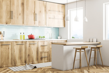 White and wooden Scandinavian kitchen corner