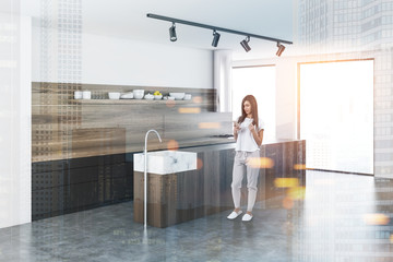 Black countertops in kitchen side view toned