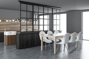 Gray and wooden kitchen and dining room
