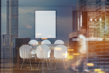 Gray dining room, wooden table and poster blur