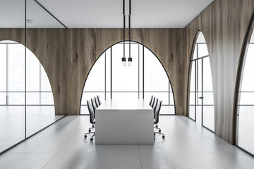 Arched window meeting room interior, white table