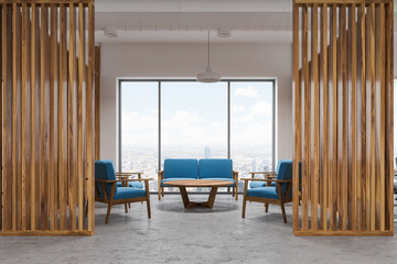 Wood office waiting room interior, blue sofas