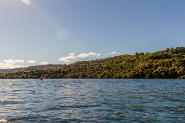 Tourist fishing in Lake Taupo, New Zealand