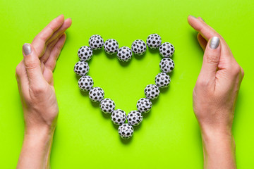 Heart mage from  candies, football ball shaped