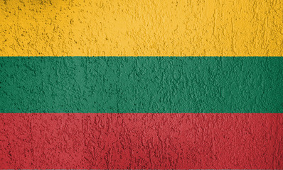 Texture of Lithuania flag  on the wall of  relief plaster.