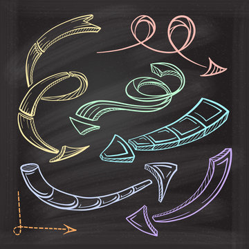 Vector colorful hand drawn arrows icons set on chalkboard