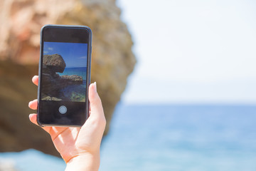The girl is making a photo