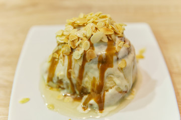 Cinnamon bun on a white plate