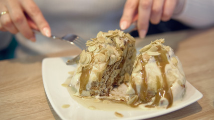 Close-up of a bun with cinnamon and nuts