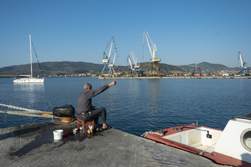 Old fishermen at Thessaloniki port, Greece
