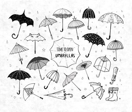 Set of doodle sketch umbrellas on rice paper background