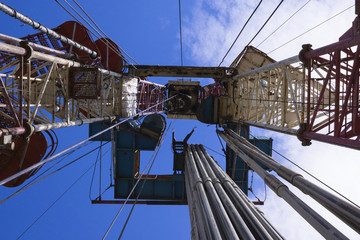 Oil and Gas Drilling Rig. Oil drilling rig operation on the oil platform in oil and gas industry.
