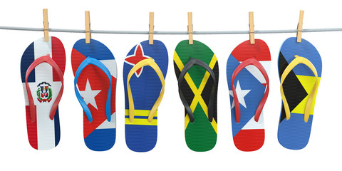 Hanging flip flops in colors of flags of different carribean countries Aruba, Bahamas, Cuba, Dominicana, Jamaica, Puerto-Rico. Travel and tourism concept.