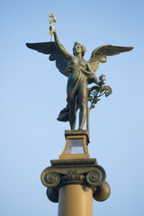 Obraz premium A sculpture of angel on Chekhov Bridge close up, Prague
